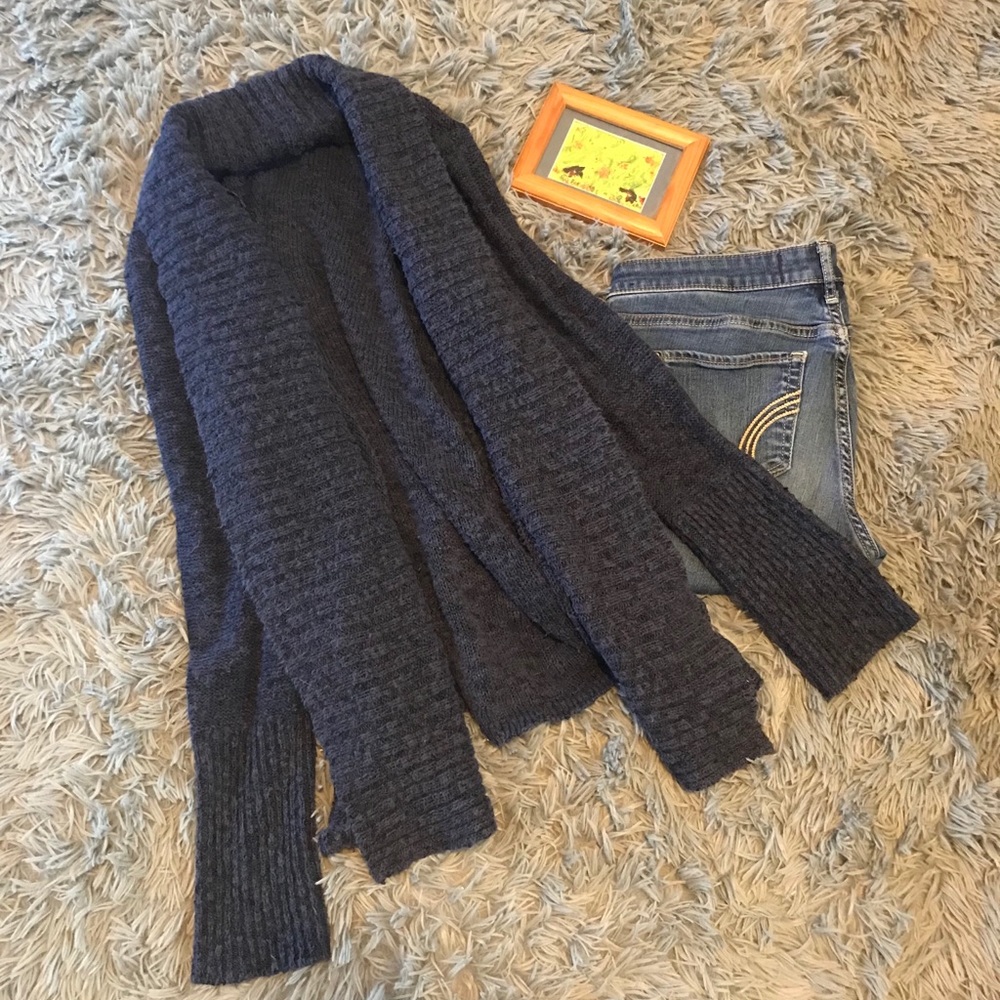 Dark blue cardigan sweater.